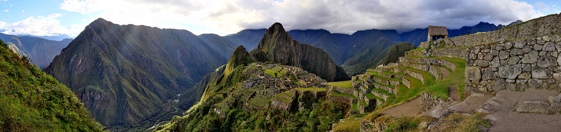 Wide view across Machu Picchu's upper terraces, the citadel and the Urubamba valley